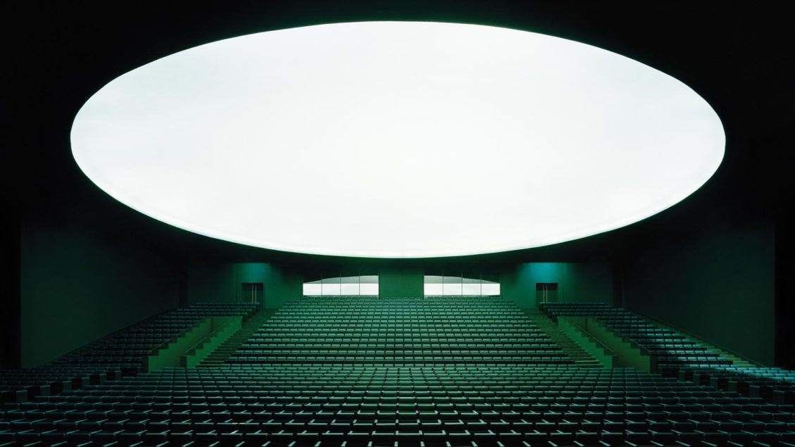 Ricardo Bofill Taller de Arquitectura designs a lecture hall in Morocco with a deep green auditorium at its centre