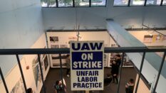 looking down into a classroom with a labor strike sign